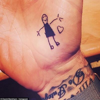 David Beckham khoe hình xăm ngộ nghĩnh do con gái Harper vẽ 11