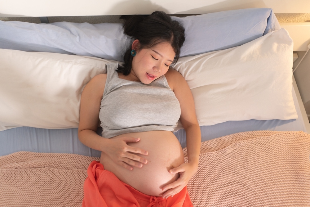 tại sao nằm ngửa thai nhi đạp nhiều​